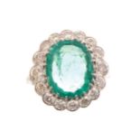 Platinum mounted emerald (5.11 ct.) ring