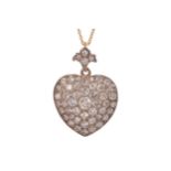 Pave set diamond pendant in yellow and white gold