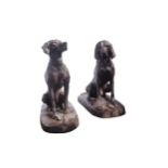 Pair of large cast iron gun dogs