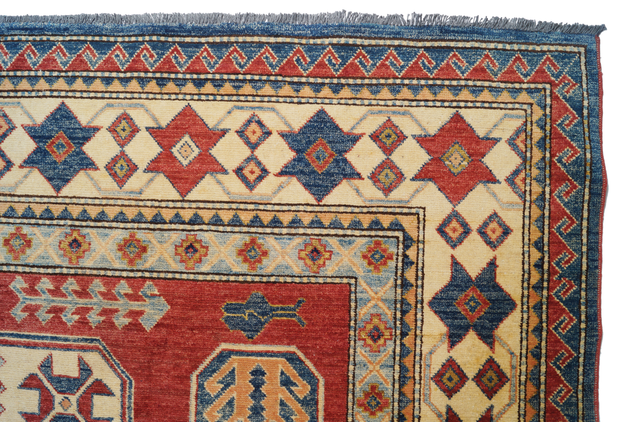 KAZAKH CAUCASIAN CARPET with ivory border and two rectangular blue medallions 327 x 236 cm. - Image 4 of 6