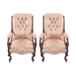 PAIR OF NINETEENTH-CENTURY MAHOGANY AND UPHOLSTERED SCROLL BACK LIBRARY CHAIRS each with a deep