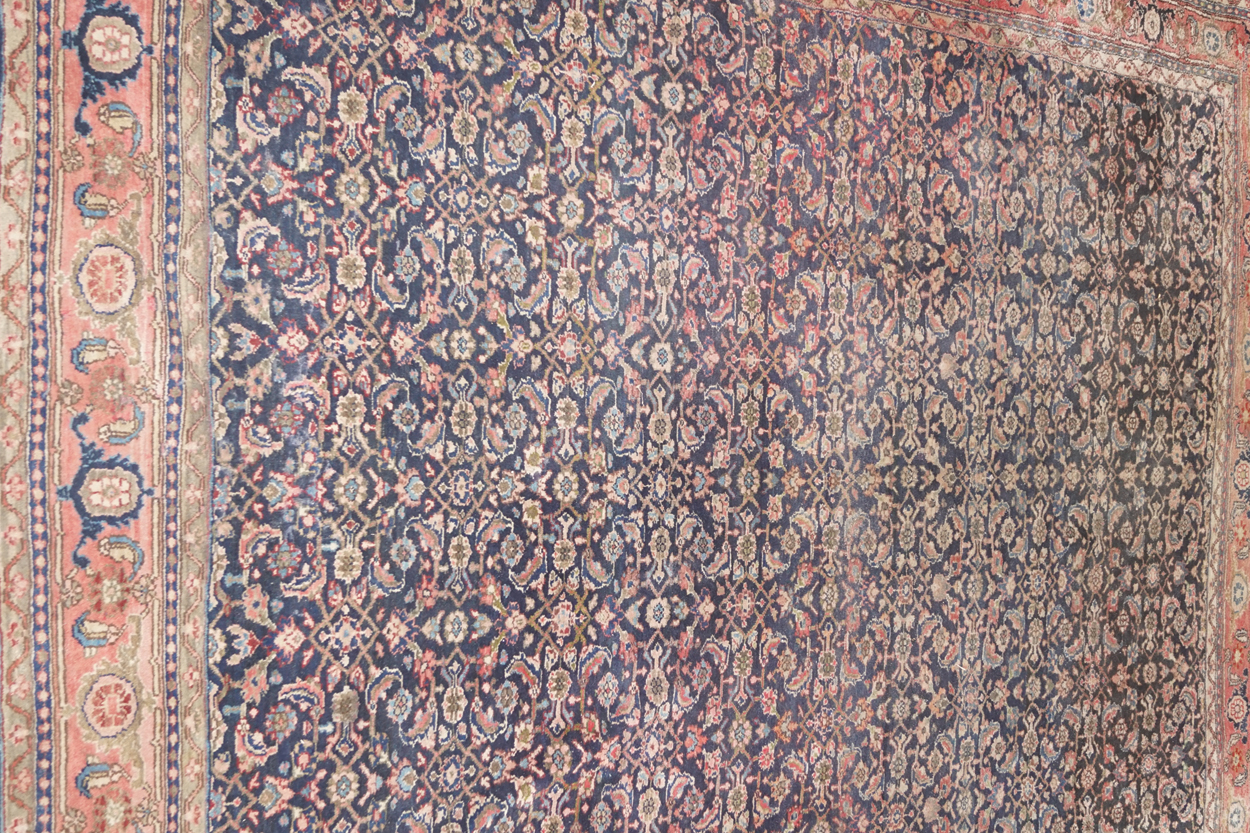 LARGE PERSIAN CARPET ON BLUE AND RED GROUND 357 x 265 cm. Worldwide shipping available. Contact