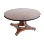 WILLIAM IV PERIOD ROSEWOOD AND ORMOLU MOUNTED CENTRE TABLE the cross banded circular top, raised