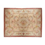AUBUSSON CARPET possibly French, on ivory ground with rose centre 435 x 308 cm. Worldwide shipping
