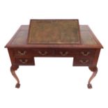 GEORGE III PERIOD MAHOGANY LIBRARY TABLE the rectangular tooled leather inset top, with a lift-up