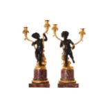 PAIR OF NINETEENTH-CENTURY ORMOLU AND BRONZE CHERUB STEMMED TABLE LAMPS each with two candle