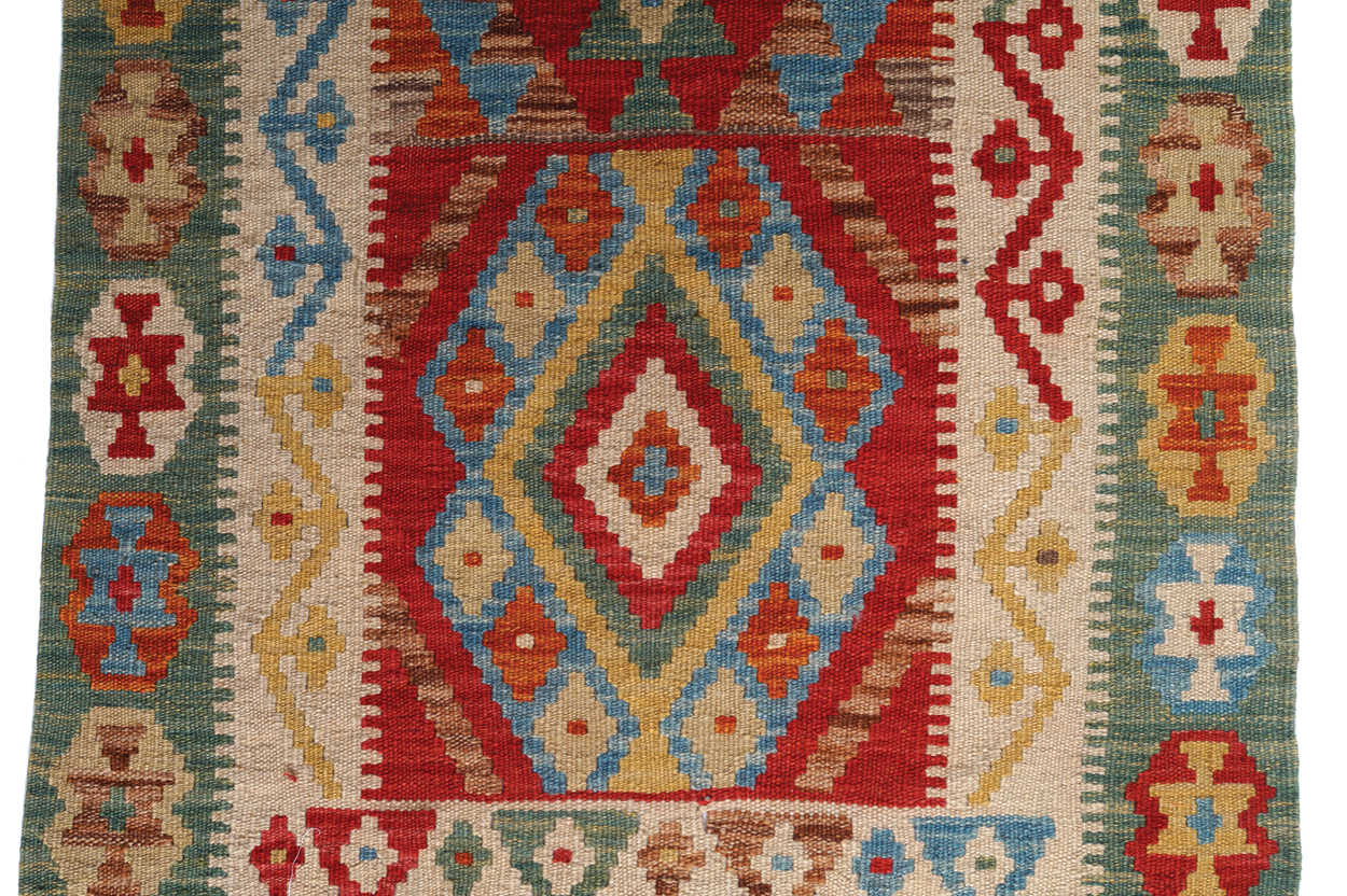 NORTHEAST PERSIAN RUNNER with outer pistachio border and twelve medallions; veg dye 496 x 75 cm. - Image 5 of 6