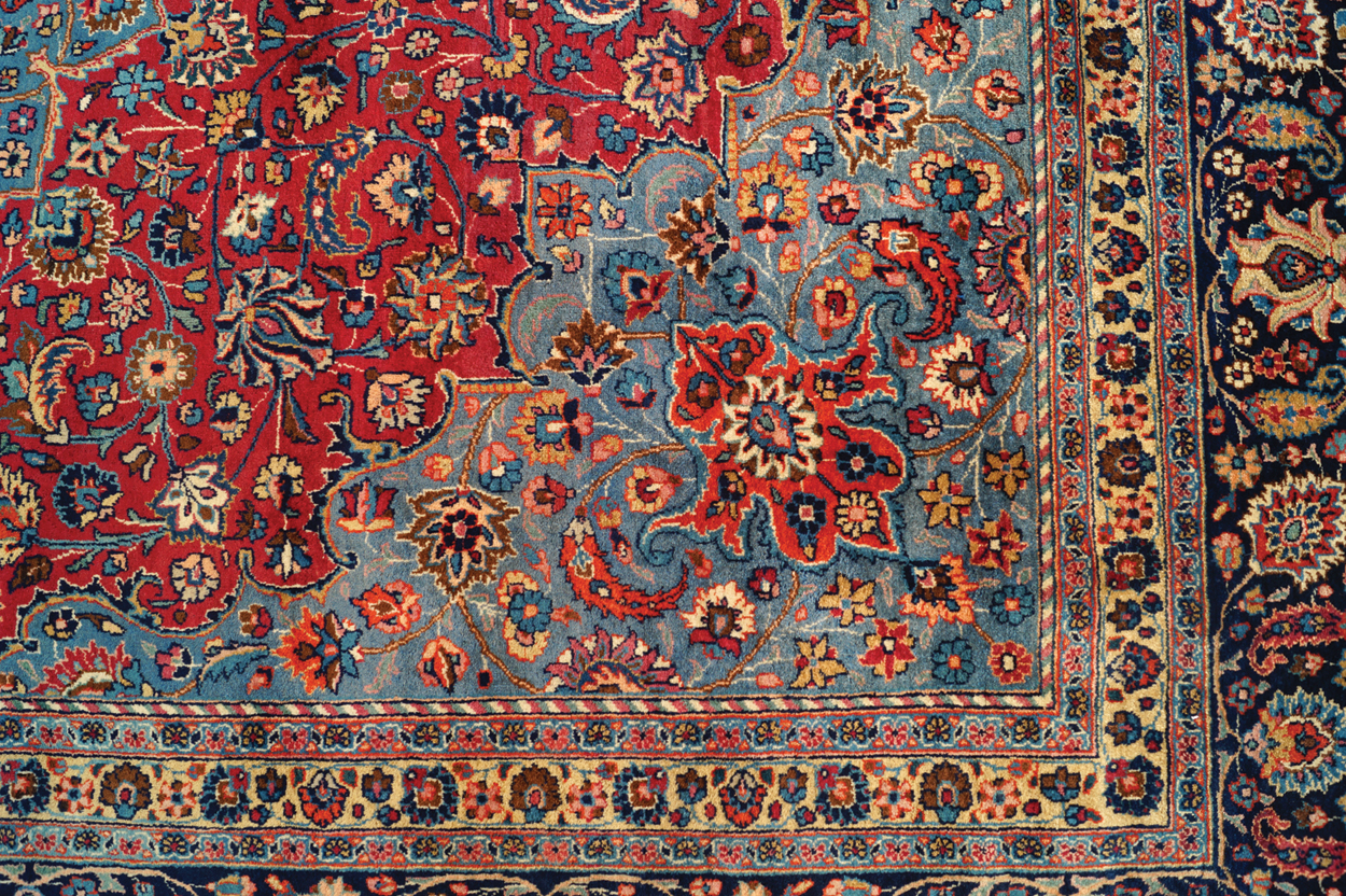 NORTHEAST PERSIAN MESHED CARPET, CIRCA 1930 on red ground with turquoise central medallion and ivory - Image 3 of 8