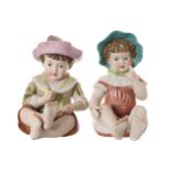 PAIR OF NINETEENTH-CENTURY LARGE BISQUE CONTINENTAL PIANO CHILDREN 24 cm. high (2) Worldwide