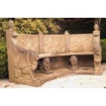 MONUMENTAL ESTATE CARVED STONE GARDEN SEAT of elliptical form raised on Sphinx scroll ends and lined