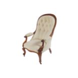 NINETEENTH-CENTURY MAHOGANY SPOON BACK GENT’S ARMCHAIR with a deep upholstered back and serpentine