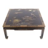 TWENTIETH-CENTURY ORIENTAL BLACK LACQUERED LOW OCCASIONAL TABLE the square top decorated with exotic