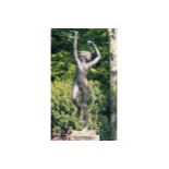 LARGE BRONZE GARDEN SCULPTURE OF A YOUNG WOMAN supported on a square plinth 170 cm. high; 40 cm.