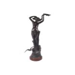 MAURICE MAIGNAN “La Vague” a figural sculpture, circa 1900 Signed bronze raised on a rouge royale