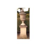 LARGE SANDSTONE ESTATE URN in the manner of William Kent, each of fluted vase form with leaf