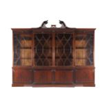 NINETEENTH-CENTURY MAHOGANY BREAKFRONT BOOKCASE the superstructure with a moulded crown above four