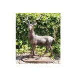 LARGE CAST-IRON STAG WITH ANTLERS raised on an oval 110 cm. wide; 138 cm. high Worldwide shipping