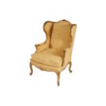 NINETEENTH-CENTURY CARVED GILT FRAMED AND UPHOLSTERED WING ARM CHAIR, CIRCA 1870 with loose