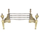 LATE NINETEENTH-CENTURY BRASS AND CAST IRON FIRE FRONT of serpentine form 84 cm. wide Worldwide