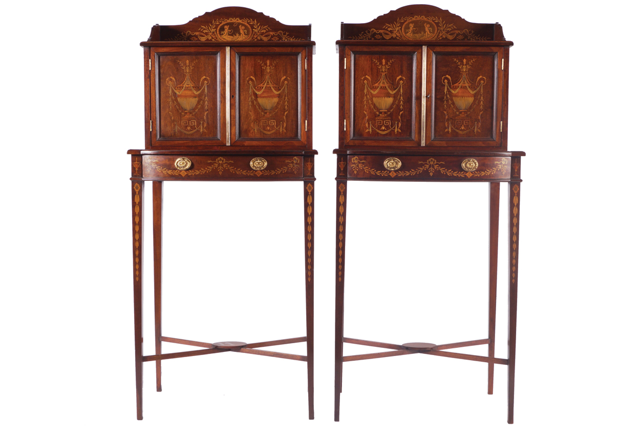 PAIR OF EDWARDIAN PERIOD MAHOGANY AND MARQUETY CABINETS each of two urn inlaid panel doors, above