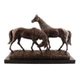 BRONZE GROUP OF A MARE AND STALLION standing on a rocky mound raised on a marble plinth 36 cm. high;