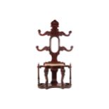 VICTORIAN MAHOGANY HAT AND COAT TREE the superstructure with four scrolled arms fronted by turned