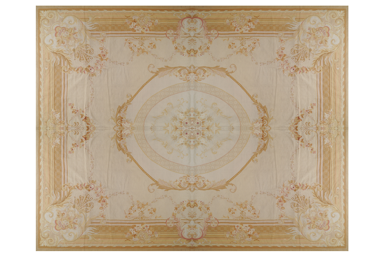 AUBUSSON CARPET possibly French, with central oval medallion 365 x 465 cm. Worldwide shipping