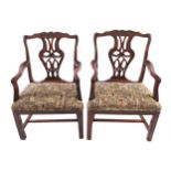 PAIR OF EIGHTEENTH-CENTURY CHIPPENDALE ELBOW CHAIRS, CIRCA 1760 each with a scallop centred leaf