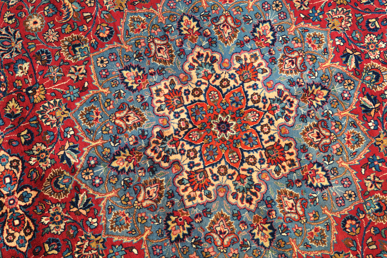 NORTHEAST PERSIAN MESHED CARPET, CIRCA 1930 on red ground with turquoise central medallion and ivory - Image 2 of 8