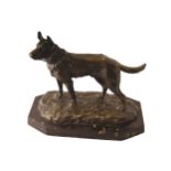 NINETEENTH-CENTURY FRENCH SCHOOL German Shepherd standing on a rocky mound, Signed Supported on a