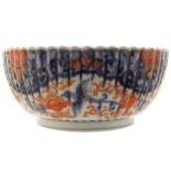 NINETEENTH-CENTURY JAPANESE IMARI BOWL of circular form with ribbed decoration 10 cm. high; 22 cm.