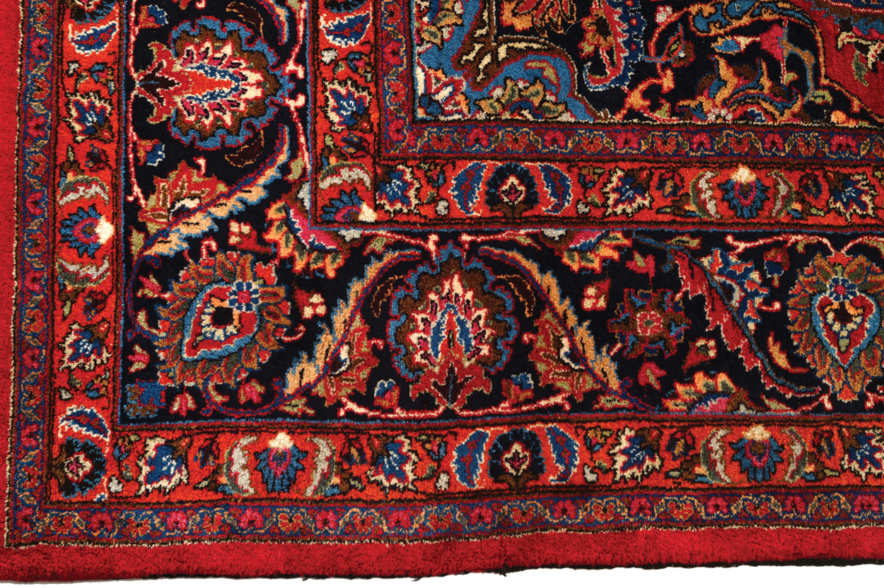 NORTHEAST PERSIAN CARPET on rich red ground with navy border; includes weaver’s signature 402 x - Image 4 of 9