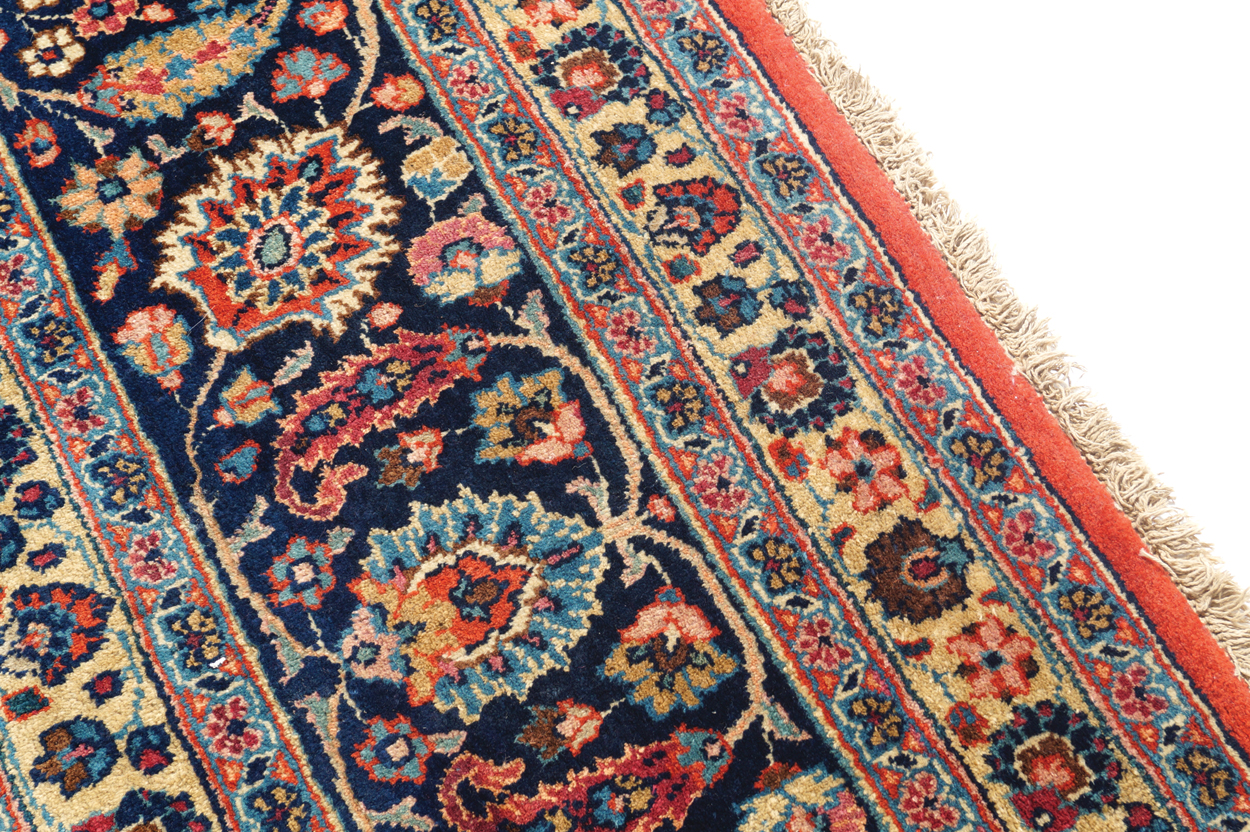 NORTHEAST PERSIAN MESHED CARPET, CIRCA 1930 on red ground with turquoise central medallion and ivory - Image 4 of 8