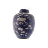 CHINESE QING PERIOD BLUE AND WHITE GINGER JAR AND COVER of bulbous form decorated with prunus. 32