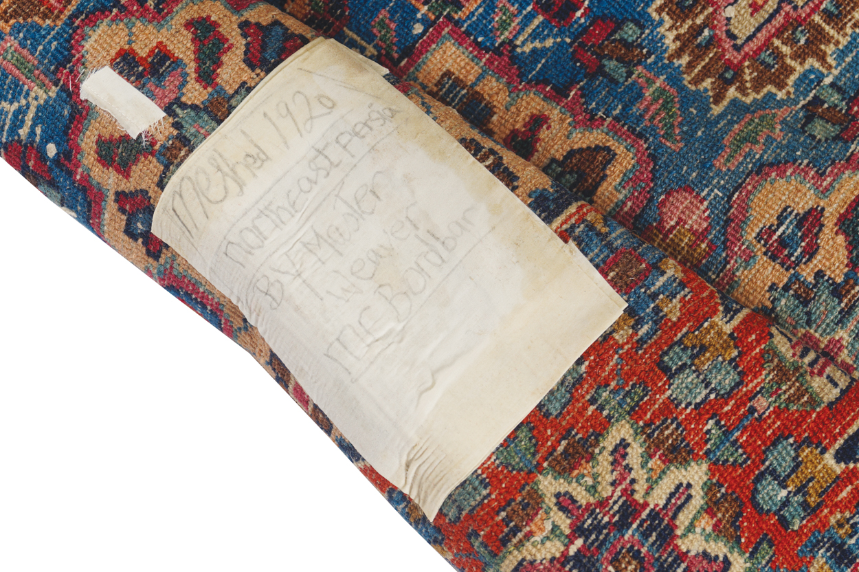 NORTHEAST PERSIAN MESHED CARPET, CIRCA 1930 on red ground with turquoise central medallion and ivory - Image 8 of 8