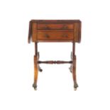 SMALL REGENCY PERIOD ROSEWOOD SOFA TABLE the rectangular top with drop leaves above a real and