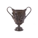 NINETEENTH-CENTURY FRENCH BRONZE VASE with raised figure and cherub decoration, furnished with