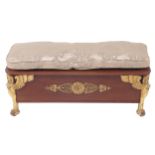 NINETEENTH-CENTURY MAHOGANY AND PARCEL GILT WINDOW SEAT the rectangular loose cushioned seat,