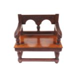 RARE NINETEENTH-CENTURY CARVED YEW WOOD CEREMONIAL HALL SEAT the gadrooned and paterae back above