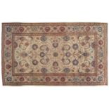 WEST PERSIAN KASHAN CARPET, CIRCA 1920 on ivory ground with all over field 134 x 220 cm. Worldwide