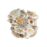 PAIR OF MASON’S IRONSTONE ASYMMETRICAL SHAPED DISHES each with all over floral decoration 19 cm.