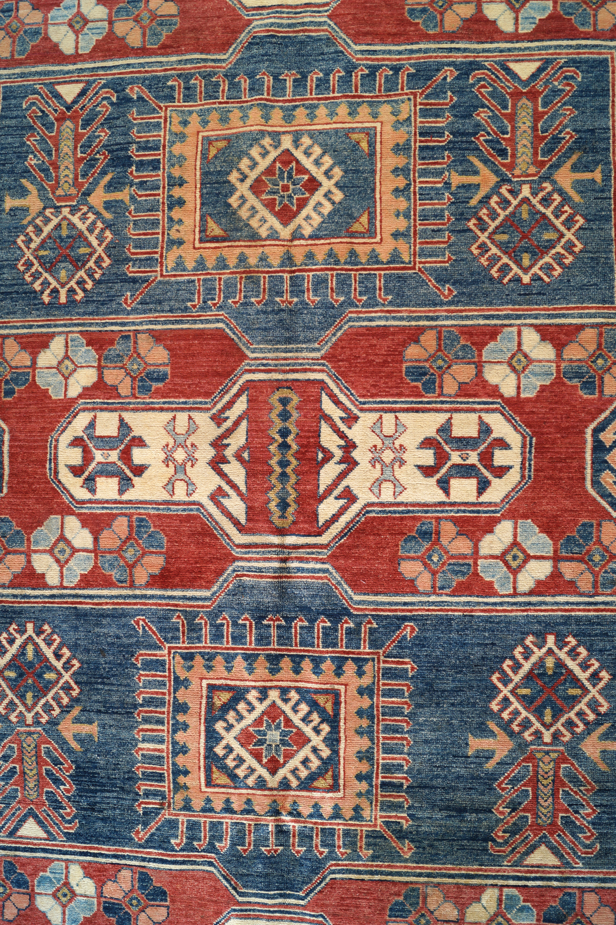 KAZAKH CAUCASIAN CARPET with ivory border and two rectangular blue medallions 327 x 236 cm. - Image 6 of 6