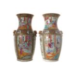 PAIR OF NINETEENTH-CENTURY CHINESE CANTONESE VASES each of baluster form with gilt fo dog handles
