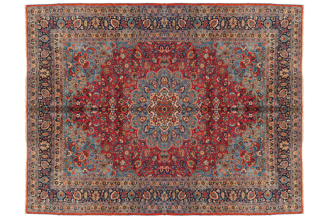 NORTHEAST PERSIAN MESHED CARPET, CIRCA 1930 on red ground with turquoise central medallion and ivory