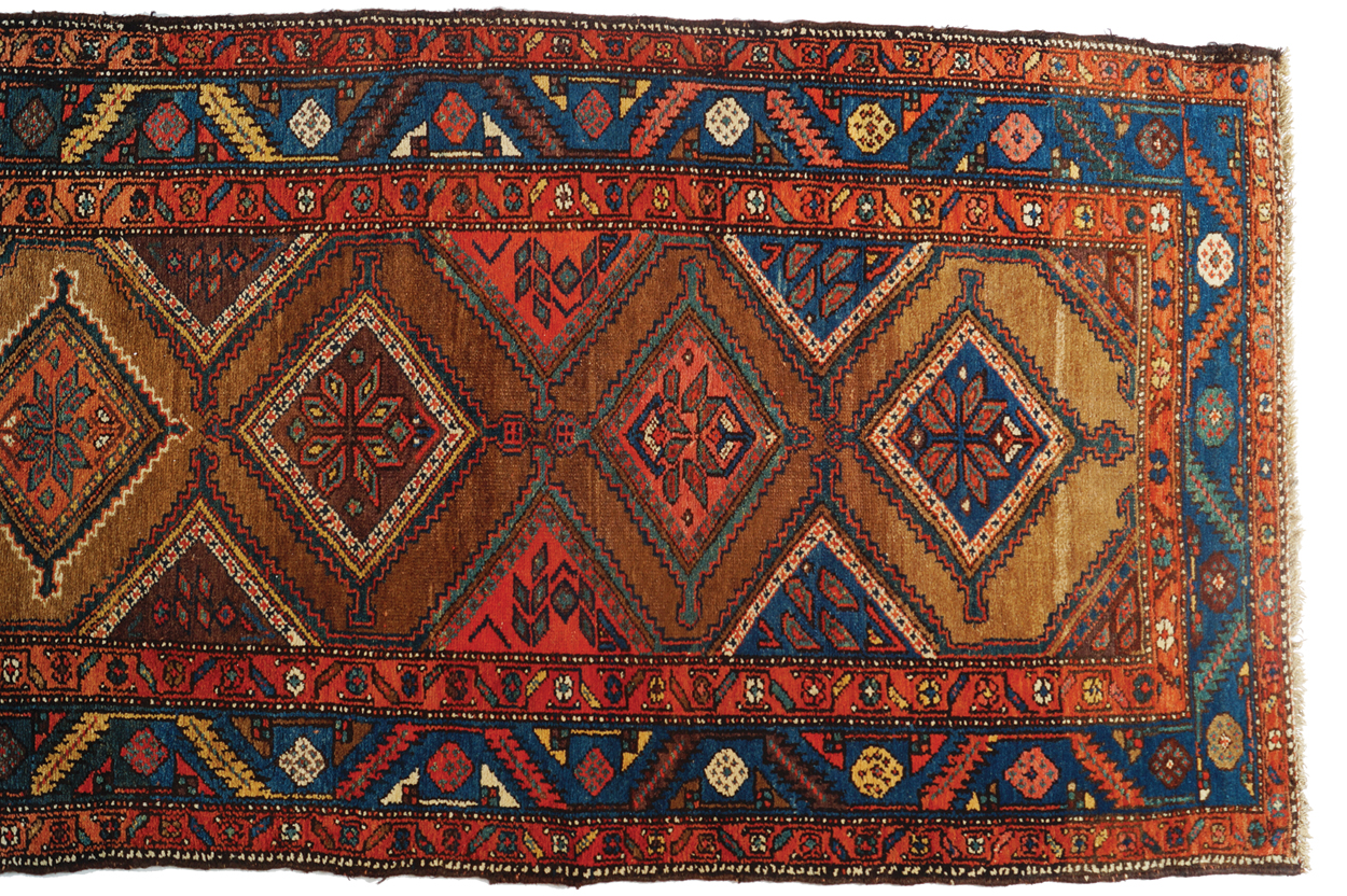 NORTHWEST PERSIAN RUNNER, CIRCA 1900 118 x 437 cm. Worldwide shipping available. Contact shipping@