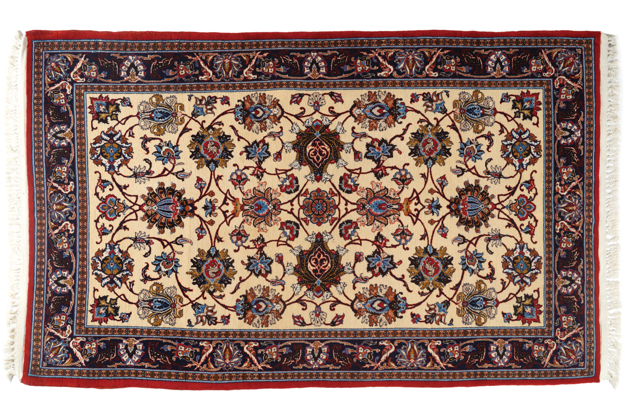 CENTRAL PERSIAN ISFAHAN RUG, CIRCA 1930 on ivory ground with all over field 139 x 230 cm.