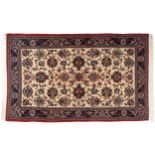 CENTRAL PERSIAN ISFAHAN RUG, CIRCA 1930 on ivory ground with all over field 139 x 230 cm.