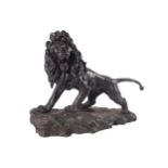 NINETEENTH-CENTURY FRENCH SCHOOL Sculpture of a roaring lion. Signed bronze. 69 cm. high; 90 cm.