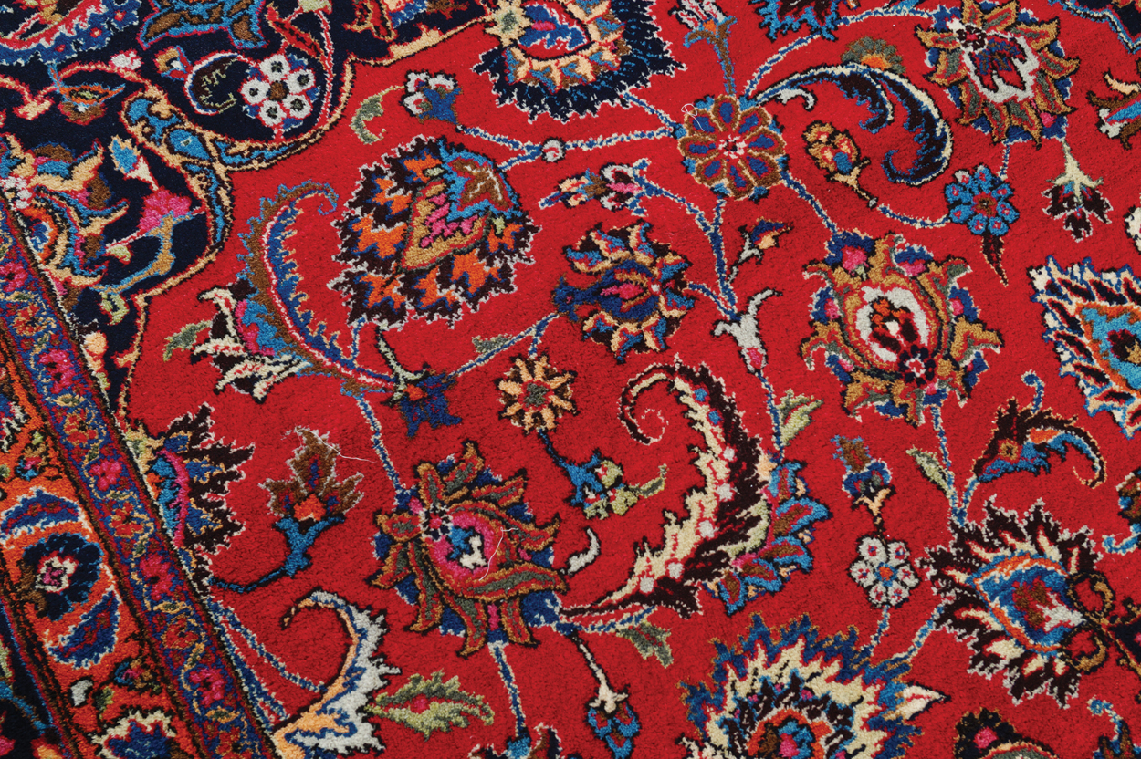 NORTHEAST PERSIAN CARPET on rich red ground with navy border; includes weaver’s signature 402 x - Image 6 of 9