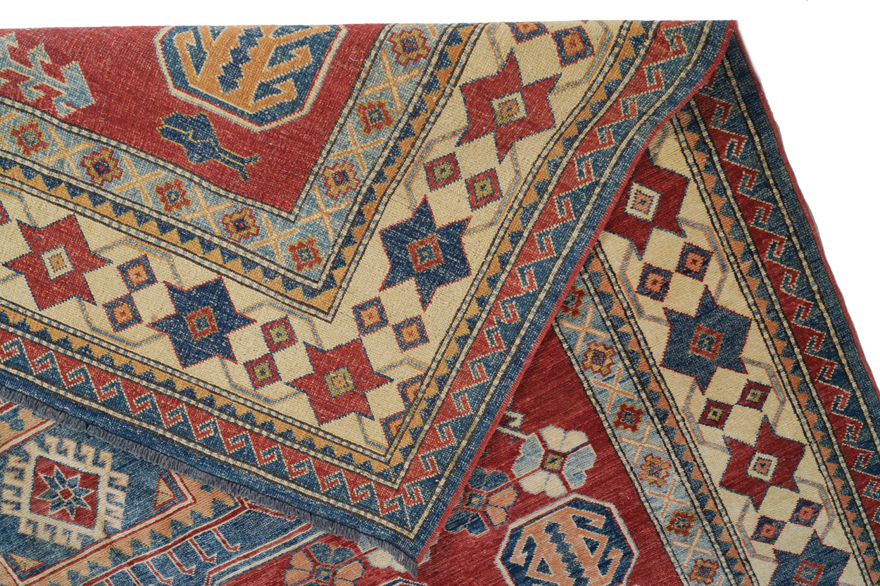 KAZAKH CAUCASIAN CARPET with ivory border and two rectangular blue medallions 327 x 236 cm. - Image 5 of 6